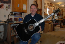 Master Luthier Dave Nichols, holds Rick’s guitar after completing an extensive restoration at Custom Pearl Inlay, Whippleville, NY (2013) Ricks Guitar